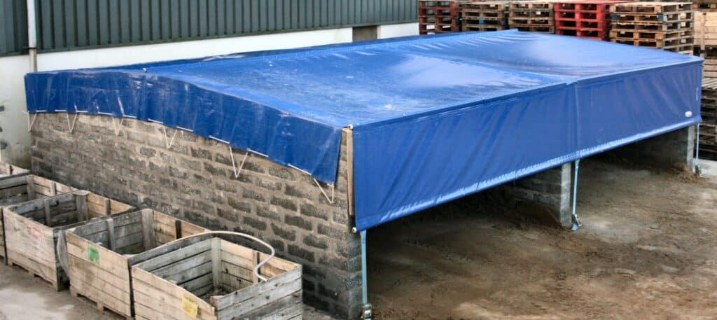 Retractable Aggregate Bay Cover in Blue PVC
