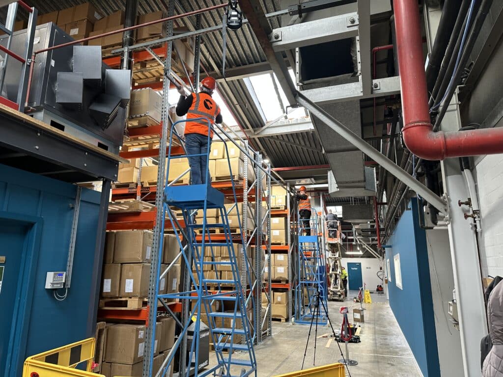 Cunningham Installation of Hunter Apparel Solutions Factory Partition